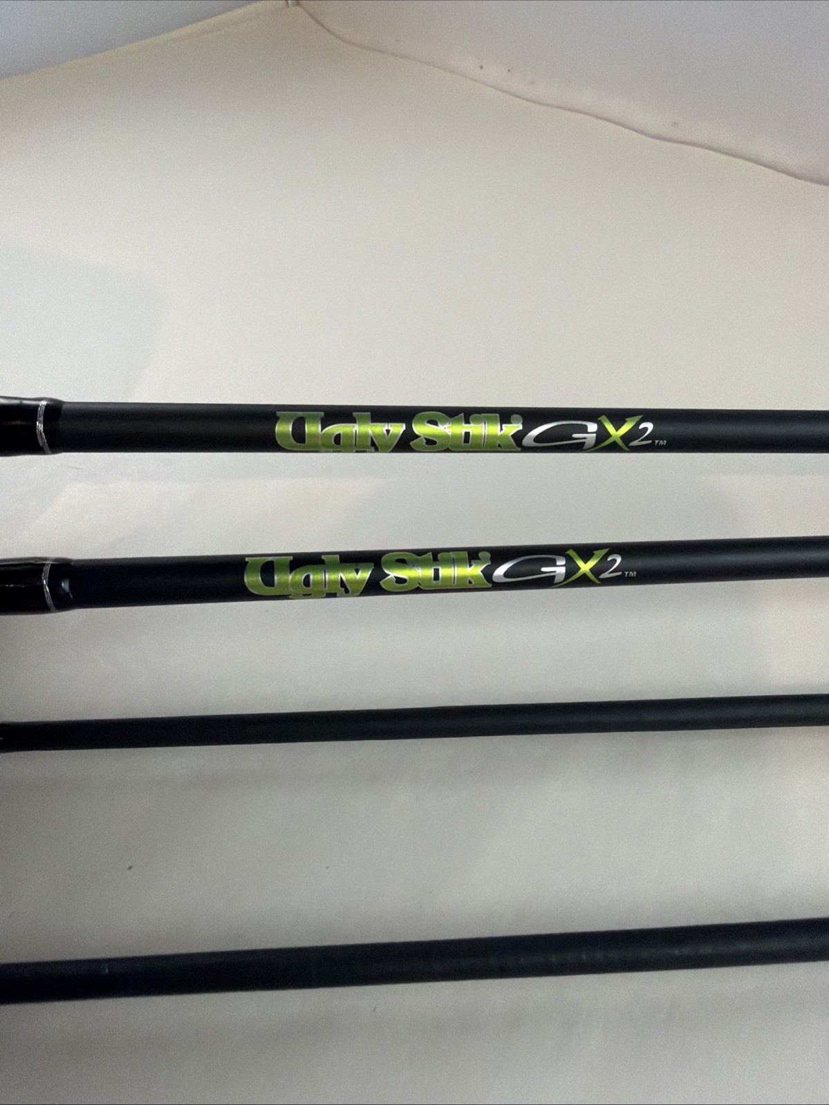 (2) Ugly Stik GX2 5′ 6″ Medium Action Spincasting Rods