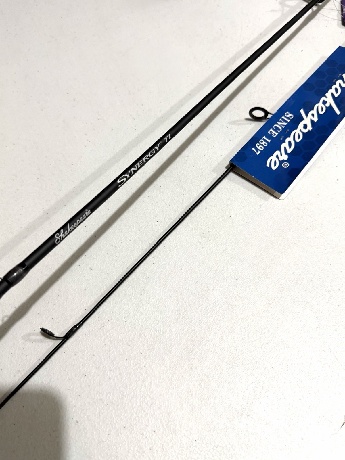 NEW Shakespeare Synergy TI Spin Casting Fishing Rod