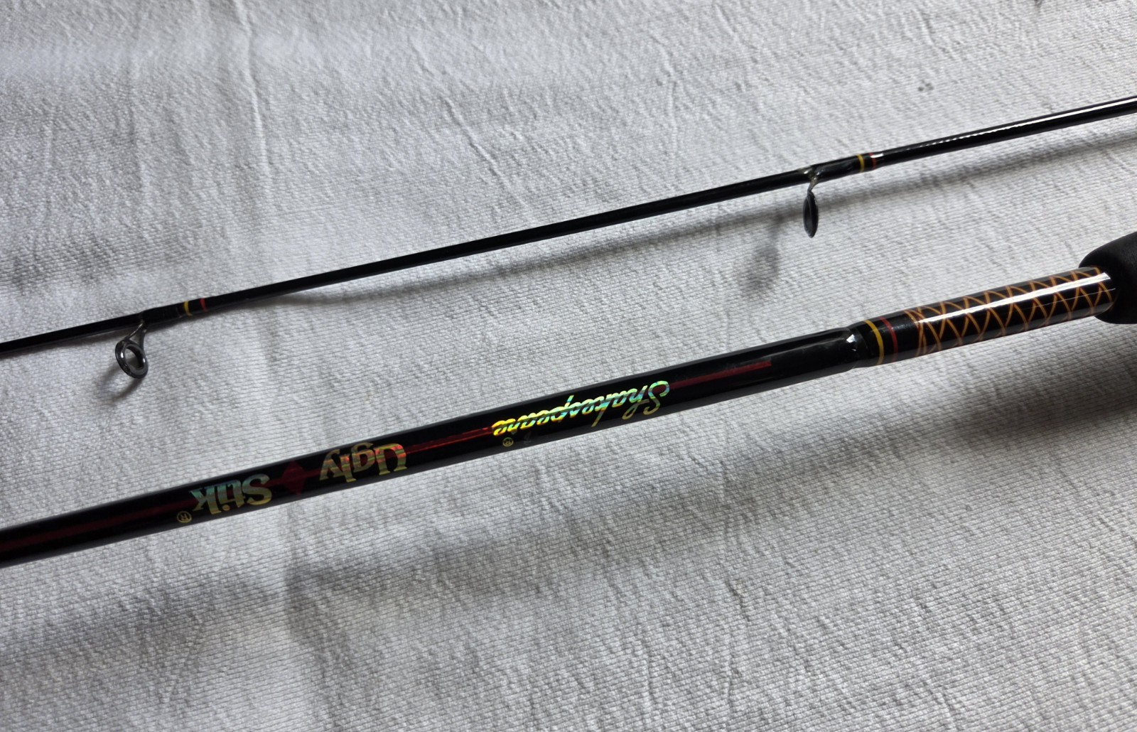 SHAKESPEARE 6′ UGLY STIK 2 PC SPINNING ROD – USED/DECENT