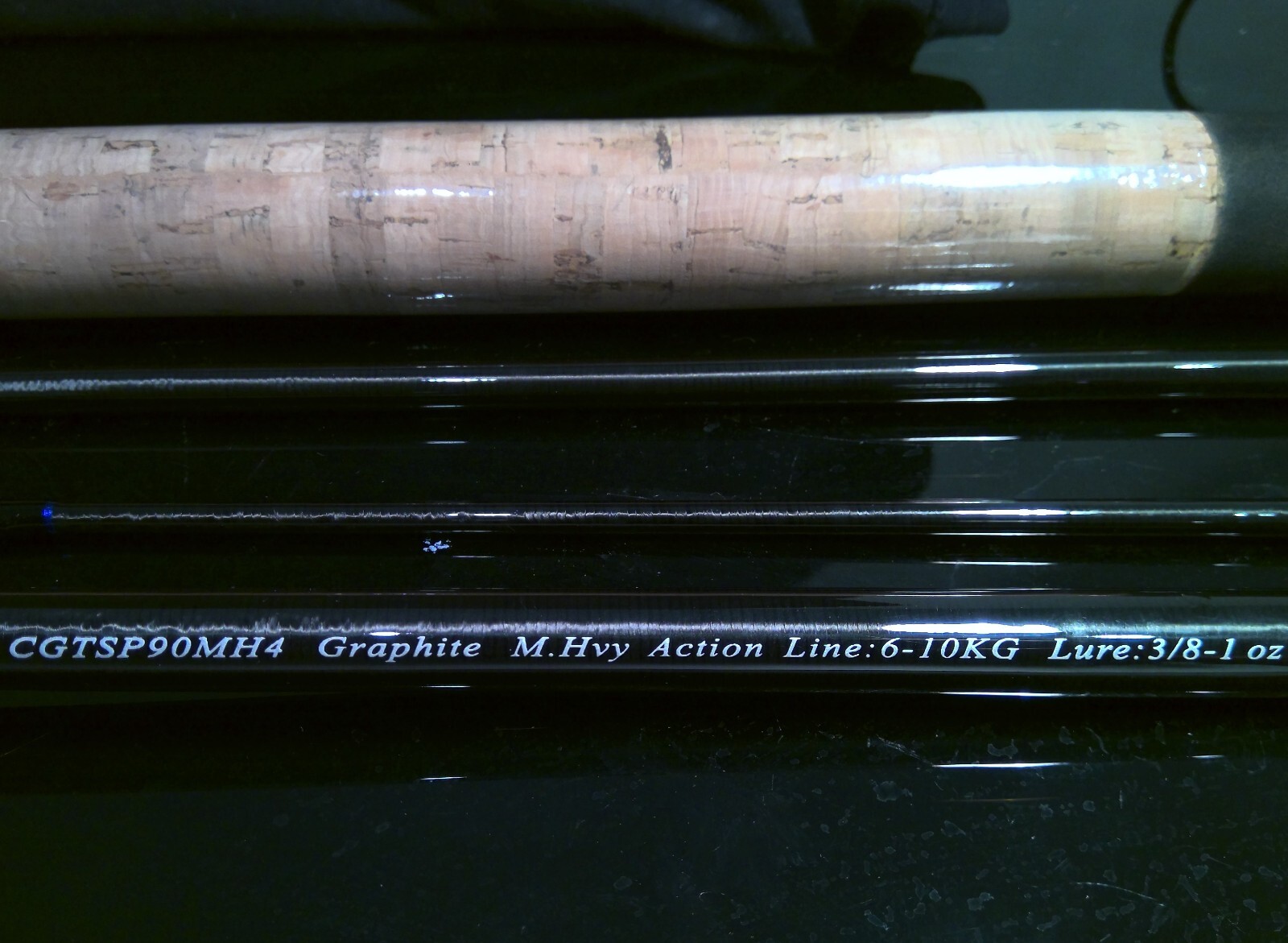 Brand new carbon Tournament spinning fishing rod, 9 ft, 4 pieces, made in Japan