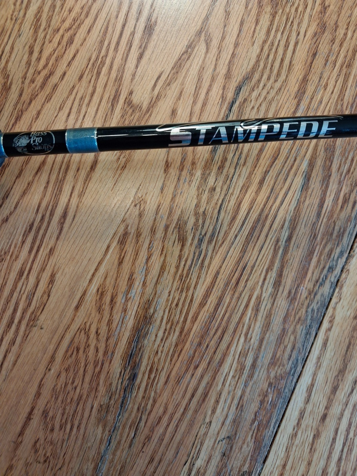 BASS PRO SHOPS, Stampede Spinning Rod, 5’6″ 2-8 LB. LINE, 2 Pieces , Excellent