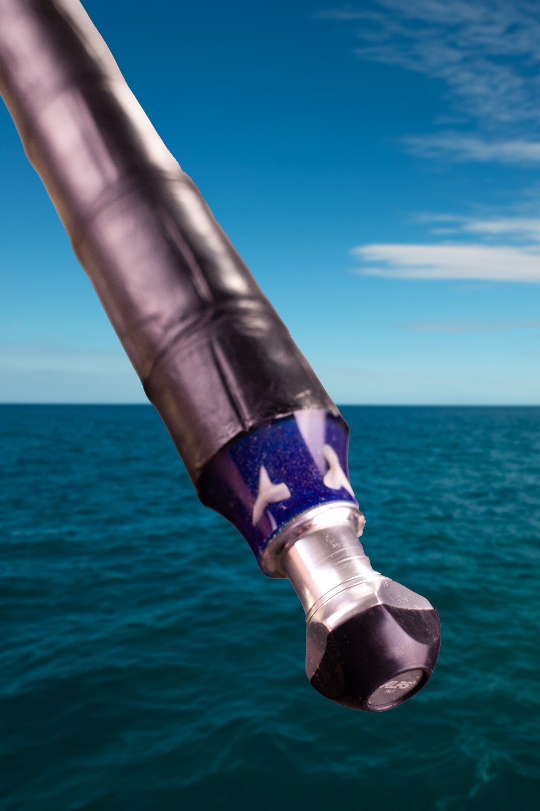 Custom Fishing Rod with Real Alligator Skin Grips and Sharks Teeth